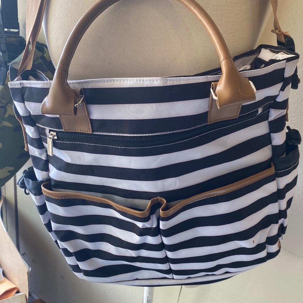 Black white and tan bag
